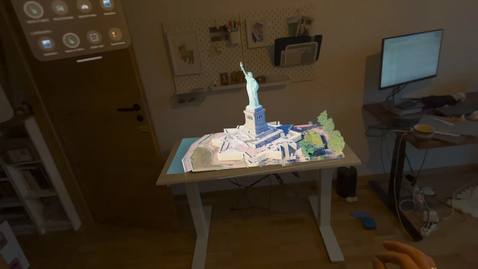 The Statue of Liberty and Liberty Island on a desk